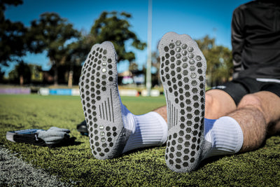 Why Every Footballer Needs Grip Socks: Boost Your Game with Better Traction and Comfort